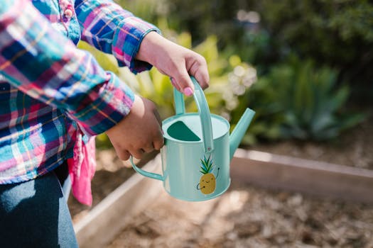 children planting in a garden