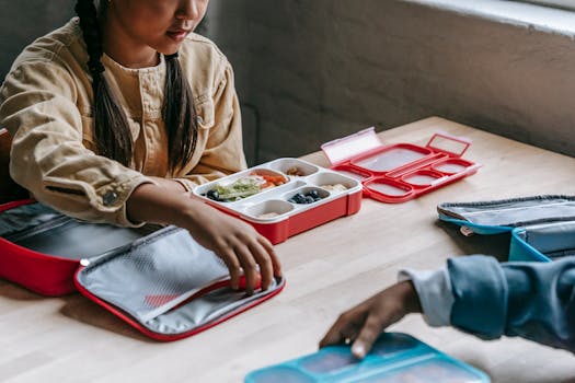 stainless steel lunchbox with fruit and vegetables