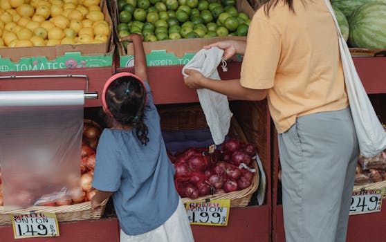 Children using reusable bags while shopping