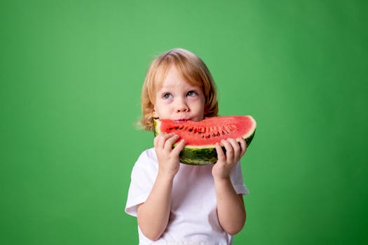 happy child enjoying organic food