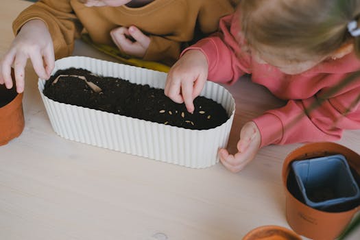 children planting in a garden